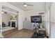 Well-lit exercise room, hardwood floors, seamlessly connects to cozy living room at 2246 Heather Glen Way, Franklin, IN 46131
