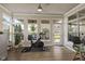 Bright exercise room with wood floors, natural light, ceiling fan, and exercise equipment at 2246 Heather Glen Way, Franklin, IN 46131