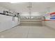 Spacious garage with ample storage, a clean epoxy floor, and an insulated door at 2246 Heather Glen Way, Franklin, IN 46131