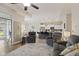 Open-concept living room connects to a kitchen, featuring modern finishes and abundant natural light, great for gatherings at 2246 Heather Glen Way, Franklin, IN 46131