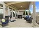 Covered patio with outdoor seating, a grill, and views of the landscaped yard at 2246 Heather Glen Way, Franklin, IN 46131