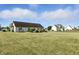 Expansive backyard with a well-maintained lawn, offering ample space for outdoor activities and enjoyment at 2308 E Mill Stream Dr, Greenfield, IN 46140