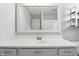 Bright bathroom featuring a white vanity with a large framed mirror and modern lighting fixtures at 2308 E Mill Stream Dr, Greenfield, IN 46140