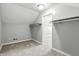 Bedroom with neutral carpet and shelves in closet, creating an open and airy space at 2308 E Mill Stream Dr, Greenfield, IN 46140