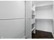 Walk-in closet with custom shelving and drawers for optimal organization and storage at 2308 E Mill Stream Dr, Greenfield, IN 46140