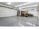 Spacious two car garage featuring epoxy floors and ample storage space at 2308 E Mill Stream Dr, Greenfield, IN 46140