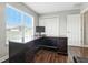 Bright office featuring hardwood floors, a large wooden desk, and a view from the window at 2308 E Mill Stream Dr, Greenfield, IN 46140