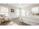 Bright bedroom with plush carpet, large windows, and comfortable furnishings offering a serene retreat at 2347 N Pennsylvania St, Indianapolis, IN 46205