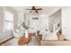 Inviting living room with a brown leather sofa, a modern area rug, and a comfortable armchair at 2347 N Pennsylvania St, Indianapolis, IN 46205
