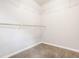 A walk-in closet featuring wire shelving and a hanging rod for clothing storage at 2347 N Pennsylvania St, Indianapolis, IN 46205