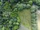 A mix of dense woodland and open land with a pond creating a private and scenic setting at 2868 S 525 W, Trafalgar, IN 46181