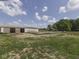 View of the large barn and surrounding land, offering ample space for storage or livestock at 2868 S 525 W, Trafalgar, IN 46181