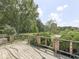 Spacious wood deck overlooks the grassy backyard at 2868 S 525 W, Trafalgar, IN 46181