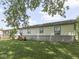 Side view of home featuring light siding and well maintained yard and landscaping at 2868 S 525 W, Trafalgar, IN 46181