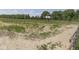Large lot featuring a wooden fence, a shed in the background and grassy areas at 2868 S 525 W, Trafalgar, IN 46181