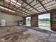 Large outbuilding interior featuring metal walls and ceiling at 2868 S 525 W, Trafalgar, IN 46181