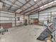 Outbuilding interior featuring storage and an open ceiling at 2868 S 525 W, Trafalgar, IN 46181