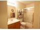 Functional bathroom with a single sink vanity and a shower with glass doors at 291 Lakemoore St, Brownsburg, IN 46112