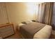 Cozy bedroom features neutral walls, wood floors, and good light at 291 Lakemoore St, Brownsburg, IN 46112