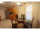 Bright kitchen nook area features stainless steel appliances, and a modern glass dining table at 291 Lakemoore St, Brownsburg, IN 46112