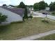 Well-maintained front yard with flower beds and green lawn, showcasing the home's curb appeal at 291 Lakemoore St, Brownsburg, IN 46112