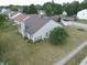 Aerial view of the home showcasing the backyard, siding, and roof, in a well-landscaped neighborhood at 291 Lakemoore St, Brownsburg, IN 46112