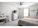 Charming bedroom with a ceiling fan, natural light, and comfortable furnishings, including a desk area at 3969 Canning St, Danville, IN 46122