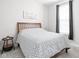 Comfortable bedroom with a wooden headboard bed, stylish bedding, and a window with natural light at 3969 Canning St, Danville, IN 46122