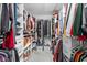 Spacious walk-in closet offers ample storage with custom shelving and hanging rods for organization at 3969 Canning St, Danville, IN 46122
