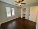 Bedroom featuring neutral walls, window with blinds, and closet for storage space at 4049 Zinfandel Way, Indianapolis, IN 46254