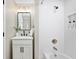Bright bathroom featuring a modern vanity, shower, and elegant decor at 413 E Caven St, Indianapolis, IN 46225