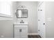 Bathroom showcasing a modern vanity, quartz countertops, and stylish fixtures at 413 E Caven St, Indianapolis, IN 46225