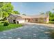 Charming brick home with a spacious driveway and attached two-car garage at 450 W 250 N, Lebanon, IN 46052