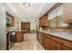 Well-lit kitchen with stainless steel appliances and warm wood cabinetry at 450 W 250 N, Lebanon, IN 46052