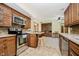 Charming kitchen featuring a stainless steel range and bar top with seating at 450 W 250 N, Lebanon, IN 46052