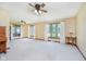 Spacious living room with neutral carpeting and multiple windows providing natural light at 450 W 250 N, Lebanon, IN 46052