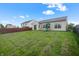 A large backyard with play set and privacy fence at 452 Southern Pines Dr, Whiteland, IN 46184
