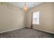 Bedroom featuring carpet, a hanging light fixture, and cheerful wall accents at 452 Southern Pines Dr, Whiteland, IN 46184