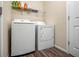 Laundry room featuring modern washer and dryer and shelving for storage at 452 Southern Pines Dr, Whiteland, IN 46184