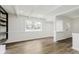 Open-concept living room offering luxury vinyl plank flooring and natural light at 5134 Rinehart Ave, Indianapolis, IN 46241