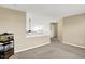 Open bonus room with neutral walls, carpet, vaulted ceiling, and view of hallway at 5225 Thompson Park, Indianapolis, IN 46237