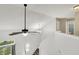 Two story foyer with carpeted stairs, a vaulted ceiling, and a view of the bathroom upstairs at 5225 Thompson Park, Indianapolis, IN 46237