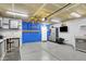 Spacious garage with ample lighting, organized storage, and a functional workstation at 5225 Thompson Park, Indianapolis, IN 46237