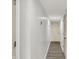 Hallway with neutral colored walls and floors at 5225 Thompson Park, Indianapolis, IN 46237