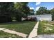 Charming single story home with a lush, well-manicured front yard and sidewalk at 5387 E County Road 800 S, Mooresville, IN 46158