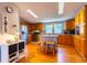 Well-equipped kitchen with stainless steel appliances, central island, and wooden cabinetry, offering ample storage at 5387 E County Road 800 S, Mooresville, IN 46158
