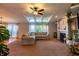 Spacious living room with a fireplace, modern decor, and ample seating, creating an inviting atmosphere at 5387 E County Road 800 S, Mooresville, IN 46158