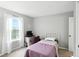 Bedroom featuring a desk area, a bed with white linen, and lots of natural light at 6495 Titania Dr, Indianapolis, IN 46236