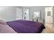 Bedroom with views of walk-in closet, vanity, and bathroom, providing ample storage at 6495 Titania Dr, Indianapolis, IN 46236