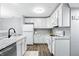Lovely kitchen with updated stainless-steel appliances and granite countertops at 6495 Titania Dr, Indianapolis, IN 46236